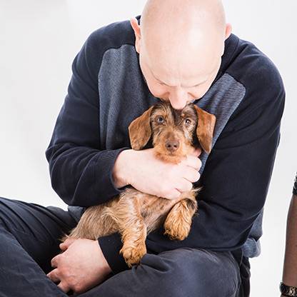 Kevin with Dottie a pin-wire miniature Dachshund puppy